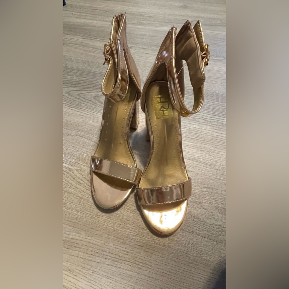 Gold heels women size 6 wore once no box no return and no refund
